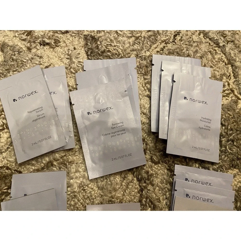 NEW Norwex Samples Renewing Eye Cream Rejuvenating Serum Moisturizer Powder